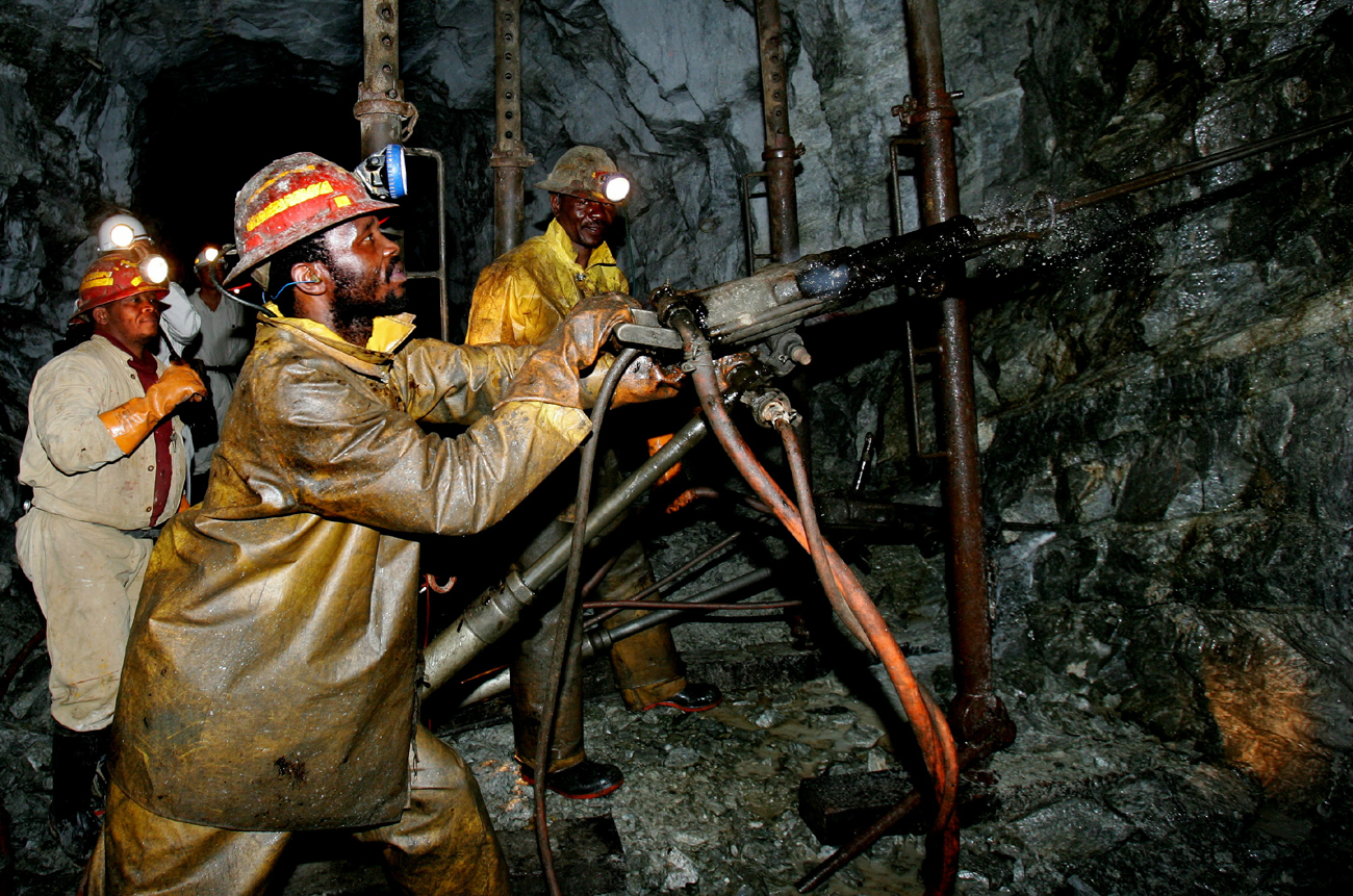 Mineworkers work deep underground at Harmony Gold Mine's Cooke shaft near Johannesburg, September 22..